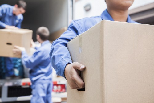 Shoreditch removal team handling residential move logistics in a busy East London street