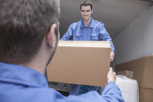 Removal team assisting a move on a Shoreditch street