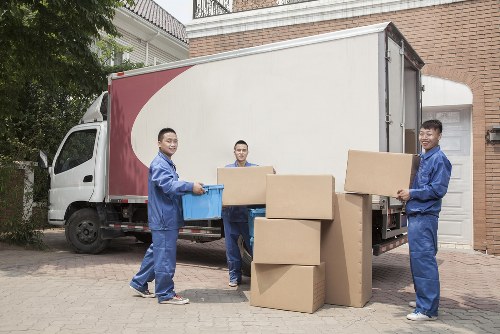 Person reviewing a transparent removals quote for a Shoreditch flat move
