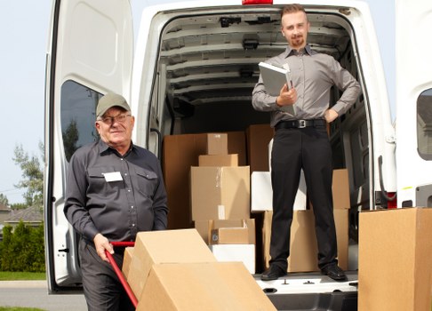 Moving van and packed boxes for Shoreditch removals