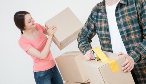 Commercial removals team moving office equipment in Shoreditch
