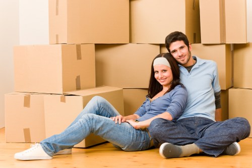 Packing boxes and moving equipment prepared for a Shoreditch relocation