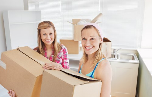 Packed boxes and moving supplies prepared for a Shoreditch house relocation